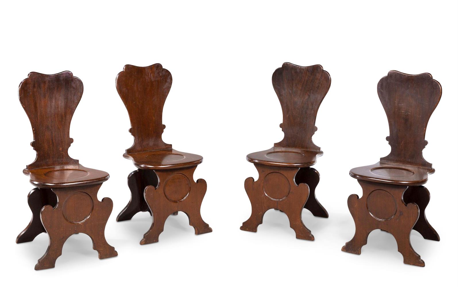 A SET OF FOUR GEORGE II MAHOGANY HALL CHAIRS, MID 18TH CENTURY