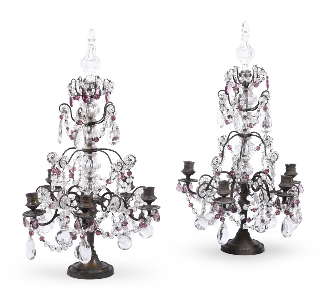 A PAIR OF CONTINENTAL PRESS MOULDED GLASS AND GILT METAL MOUNTED FIVE BRANCH TABLE CANDELABRA