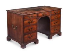 A MAHOGANY KNEEHOLE DESK IN GEORGE III STYLE, PROBABLY 19TH CENTURY