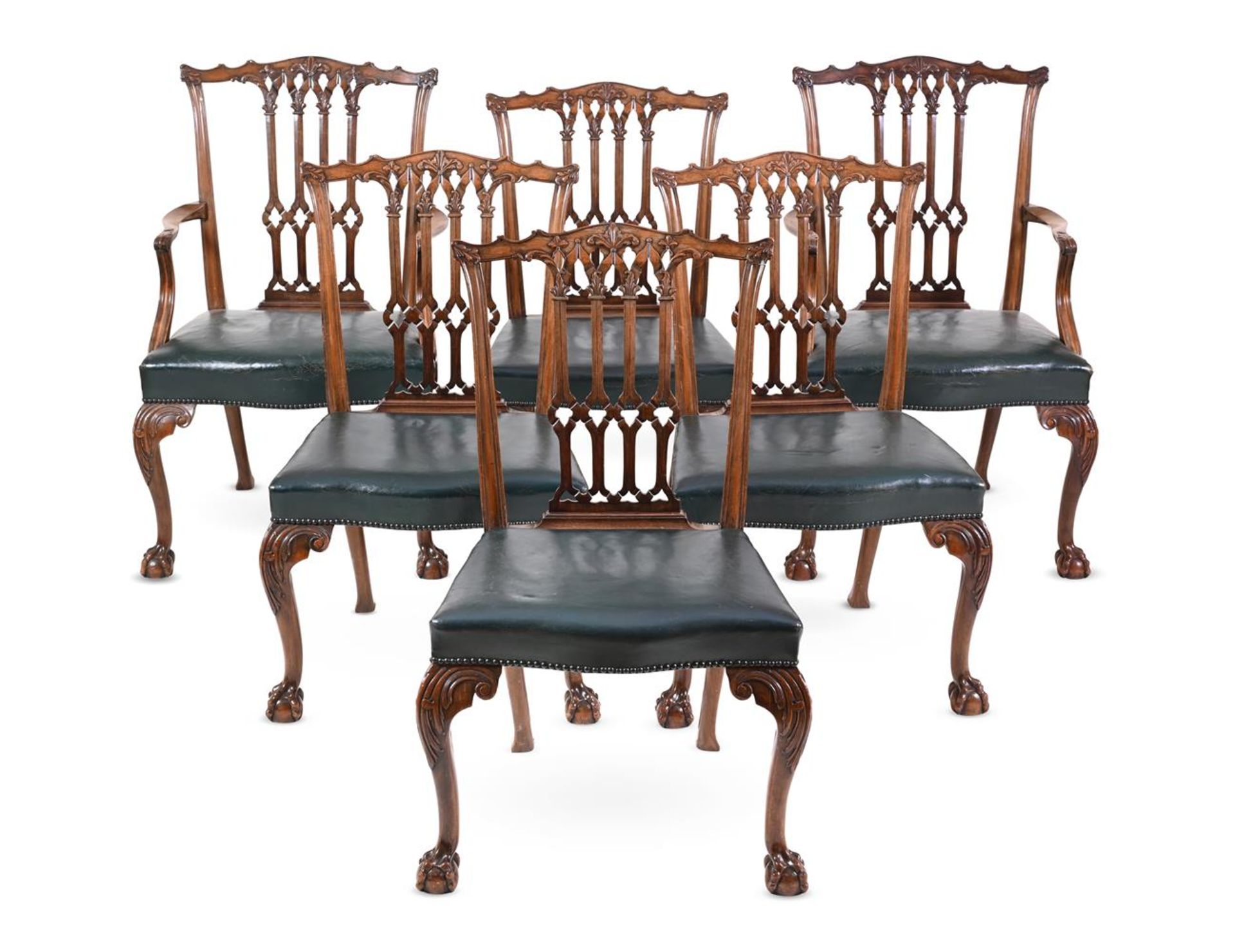 A SET OF SIX MAHOGANY AND LEATHER UPHOLSTERED DINING CHAIRS IN GEORGE III STYLE