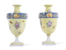 A PAIR OF CONTINENTAL PORCELAIN YELLOW GROUND URNS, LATE 19TH CENTURY