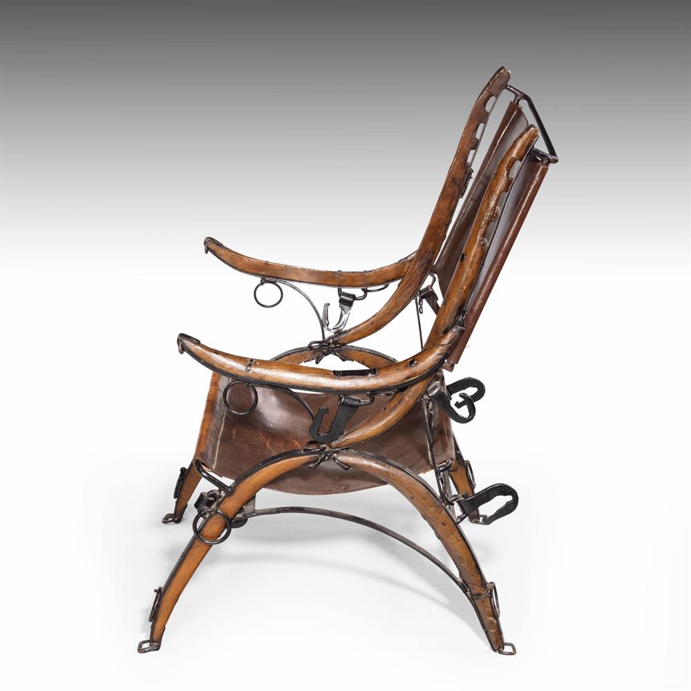 A LATE VICTORIAN BLACK-PAINTED IRON AND STAINED BEECH ARMCHAIR - Image 2 of 4