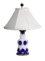 A FRENCH OPAQUE WHITE AND BLUE OVERLAID GLASS PARAFFIN LAMP BASE