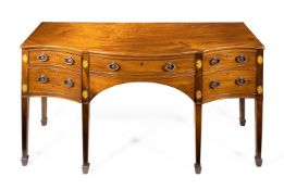 A GEORGE III MAHOGANY AND MARQUETRY SERPENTINE SIDEBOARD IN THE MANNER OF GILLOWS