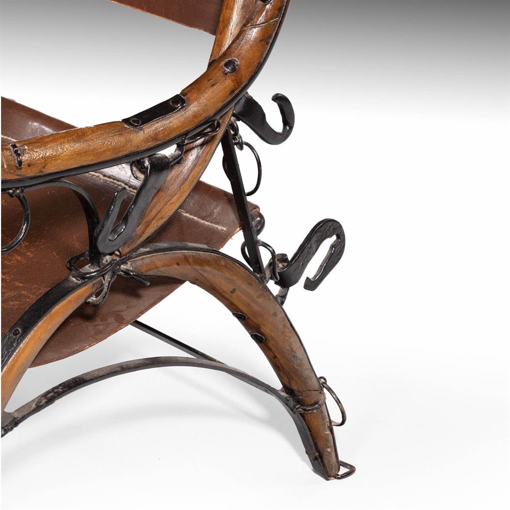 A LATE VICTORIAN BLACK-PAINTED IRON AND STAINED BEECH ARMCHAIR - Image 3 of 4