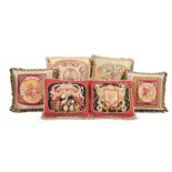 SIX LARGE CUSHIONS INCORPORATING 18TH CENTURY AND LATER WOOLWORK AND TAPESTRY AND LATER FABRIC