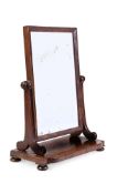 A REGENCY MAHOGANY DRESSING MIRRORIN THE MANNER OF GILLOWS