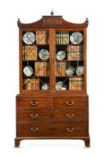 A GEORGE III MAHOGHANY BOOKCASE, IN THE MANNER OF JOHN LINNELL, CIRCA 1790