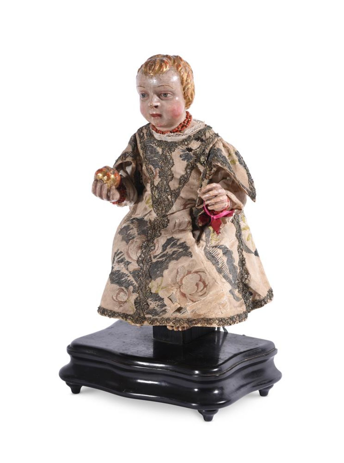 A SPANISH COLONIAL CARVED POLYCHROME FIGURE OF THE SEATED CHRIST