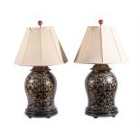 A PAIR OF BLACK JAPANNED BALUSTER SHAPE COMPOSITION LAMPS