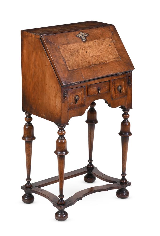 A WALNUT SMALL BUREAU ON STAND IN THE QUEEN ANNE STYLE, 20TH CENTURY