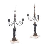 A PAIR OF PAINTED AND PARCEL GILT GESSO AND CARVED CANDLESTICKS, ITALIAN, EARLY 19TH CENTURY