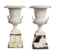 A PAIR OF CAST-IRON CAMPANA URNS AND STANDS IN THE MANNER OF HANDYSIDE, MID 19TH CENTURY