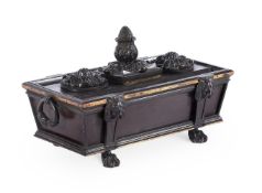 A BRONZE DESK SET IN THE FORM OF A SARCOPHAGUS, LATE 19TH CENTURY