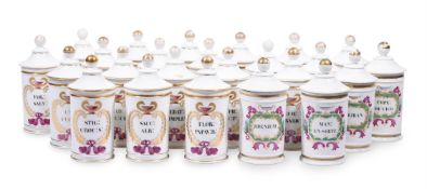A SET OF TWENTY FRENCH PORCELAIN CHEMIST JARS AND COVERS