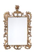 A CARVED GILTWOOD MIRROR IN GEORGE III IRISH STYLE, LATE 18TH/EARLY 19TH CENTURY