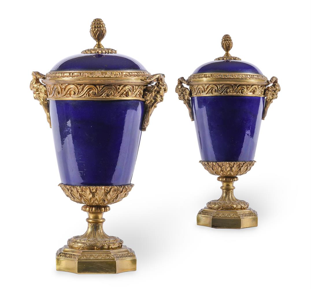 A PAIR OF SEVRES-STYLE BLUE-GROUND PORCELAIN AND GILT-METAL MOUNTED TWO-HANDLED URNSLATE 19TH CENTU