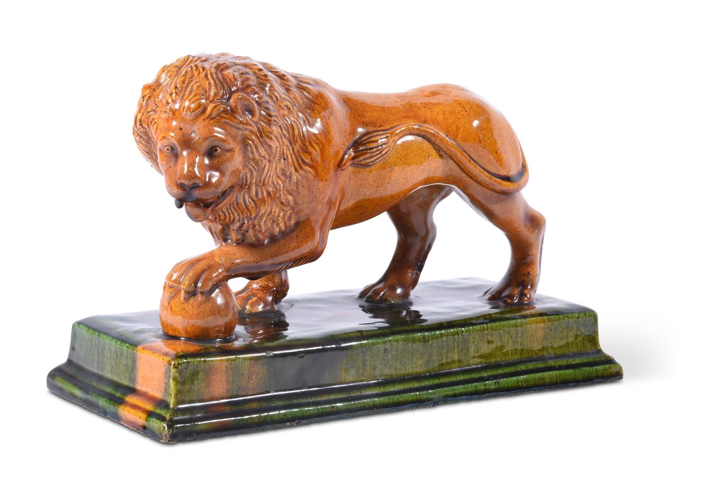A CONTINENTAL GLAZED STONEWARE MODEL OF A MEDICI LION, LATE 19TH CENTURY