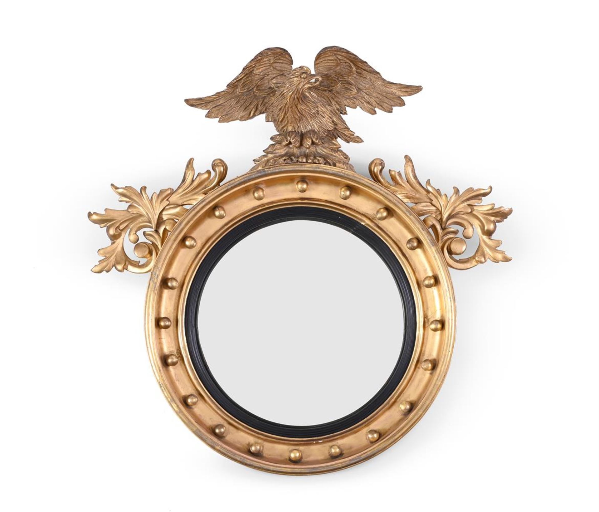 A GILTWOOD CONVEX WALL MIRROR IN REGENCY STYLE, SECOND HALF 19TH CENTURY