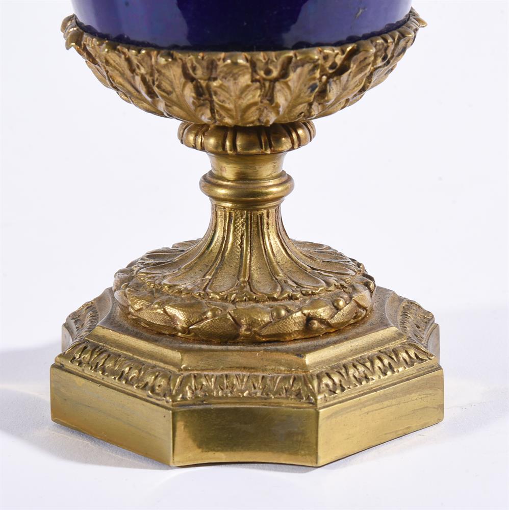 A PAIR OF SEVRES-STYLE BLUE-GROUND PORCELAIN AND GILT-METAL MOUNTED TWO-HANDLED URNSLATE 19TH CENTU - Image 3 of 3