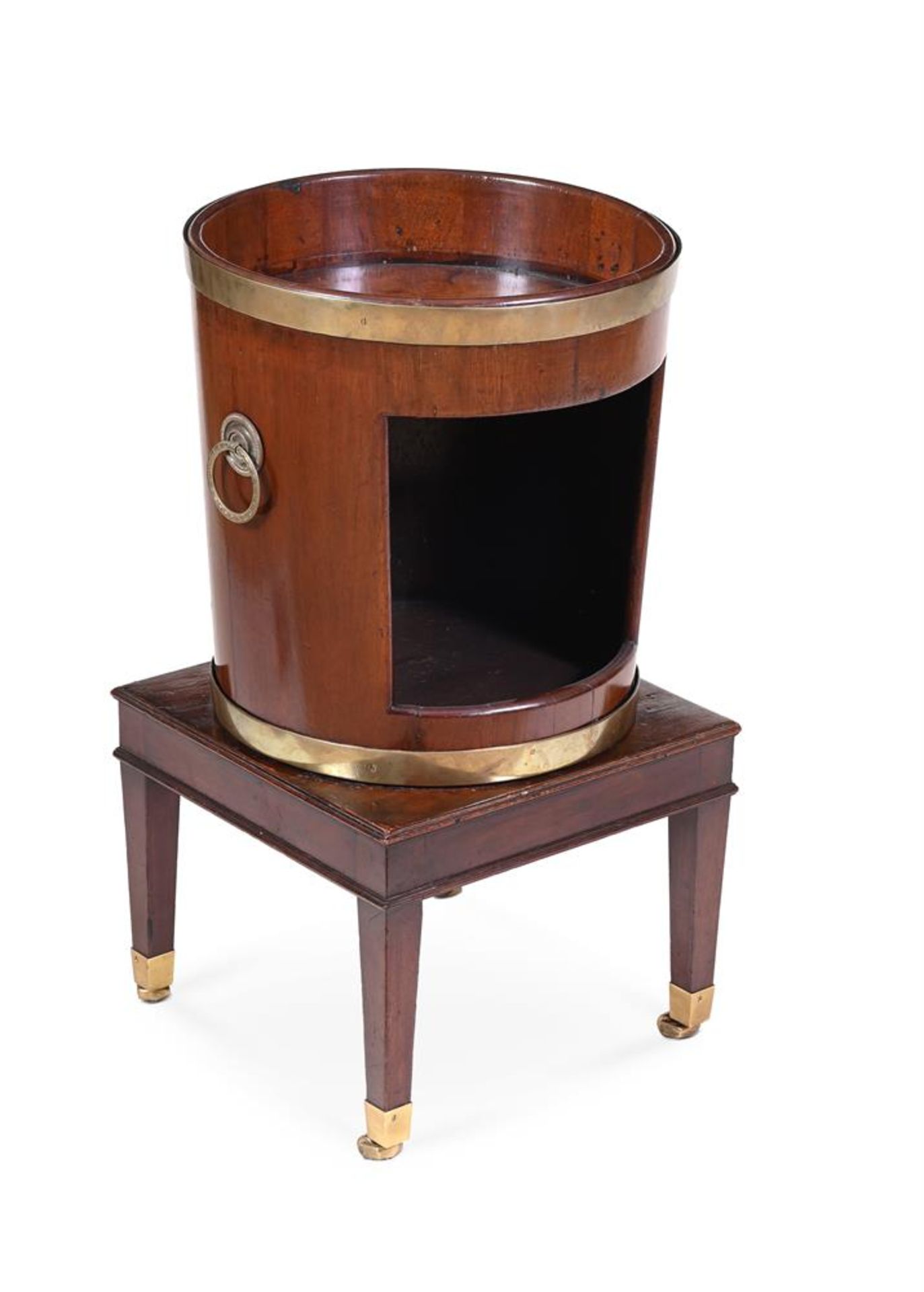 A GEORGE III MAHOGANY AND BRASS BOUND REVOLVING PLATE BUCKET ON STAND, CIRCA 1790