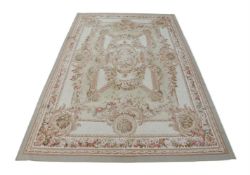 A FRENCH WOVEN CARPET IN AUBUSSON STYLE