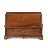 A GEORGE III MAHOGANY TABLE BUREAU, CIRCA 1760