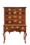 A GEORGE II OAK AND BURR WALNUT BANDED CHEST ON STAND, MID 18TH CENTURY