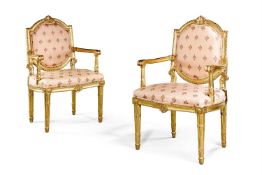 A PAIR OF ITALIAN CARVED GILTWOOD OPEN ARMCHAIRS, LATE 18TH/EARLY 19TH CENTURY