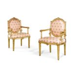 A PAIR OF ITALIAN CARVED GILTWOOD OPEN ARMCHAIRS, LATE 18TH/EARLY 19TH CENTURY
