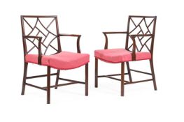 A MATCHED PAIR OF MAHOGANY 'COCKPEN' ARMCHAIRS, ONE CIRCA 1800 AND THE OTHER 20TH CENTURY