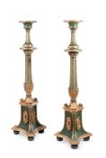 A PAIR OF GREEN PAINTED AND PARCEL GILT TORCHERES, 19TH CENTURY