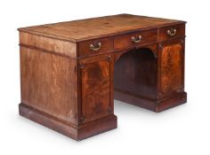 A GEORGE III MAHOGANY KNEEHOLE DESK, CIRCA 1800