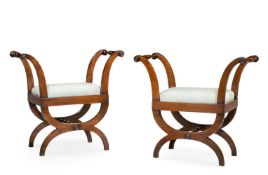 A PAIR OF FRENCH MAHOGANY X-FRAME STOOLS OR WINDOW SEATS, 19TH CENTURY
