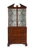 A GEORGE III MAHOGANY SECRETAIRE BOOKCASE IN THE MANNER OF THOMAS CHIPPENDALE, CIRCA 1770