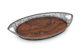 A SILVER MOUNTED OVAL TRAY