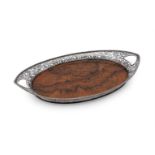 A SILVER MOUNTED OVAL TRAY