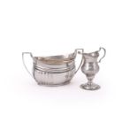 A GEORGE III SILVER OVAL TWIN HANDLED SUGAR BOWL