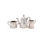 Y A VICTORIAN SILVER TAPERING OCTAGONAL TEA POT AND CREAM JUG