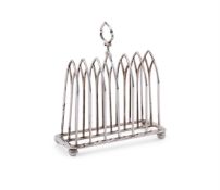 A VICTORIAN SILVER SIX DIVISION TOAST RACK