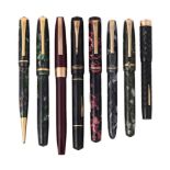 A SMALL COLLECTION OF FOUNTAIN PENS