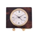 HERMES, A BRASS AND BROWN LACQUERED TRAVEL ALARM CLOCK