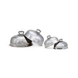 A SET OF FOUR ELECTRO-PLATED OVAL DOMED MEAT DISH COVERS
