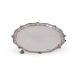 A SILVER SHAPED CIRCULAR SALVER