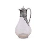 A VICTORIAN SILVER MOUNTED CLARET JUG