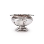 AN EDWARDIAN SILVER SHAPED CIRCULAR PEDESTAL BOWL