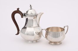 A SILVER LOBED BALUSTER COFFEE POT