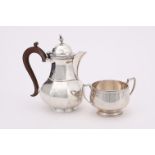 A SILVER LOBED BALUSTER COFFEE POT