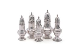 FIVE SILVER BALUSTER CASTORS