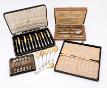 A COLLECTION OF SILVER COLOURED ITEMS